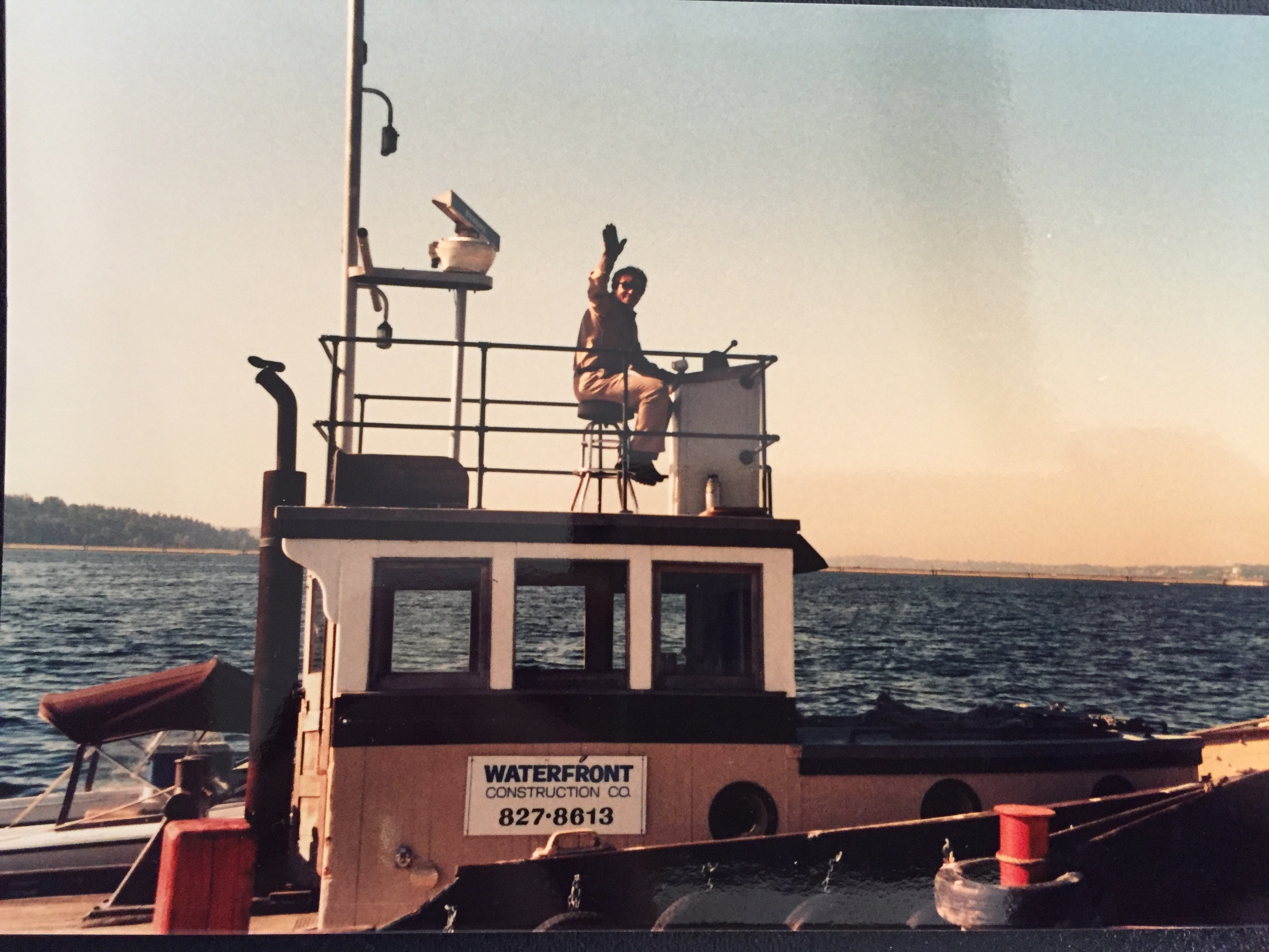 WCI founder Paul Wilcox aboard an early Waterfront Construction workboat